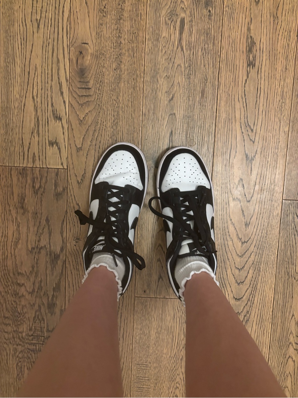 Nike Women's Black and White Low-Top Sneakers with Brown Accents
